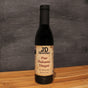Bottle of JD Gourmet Pear Balsamic Vinegar, dark aged Modena balsamic with the JD Gourmet label