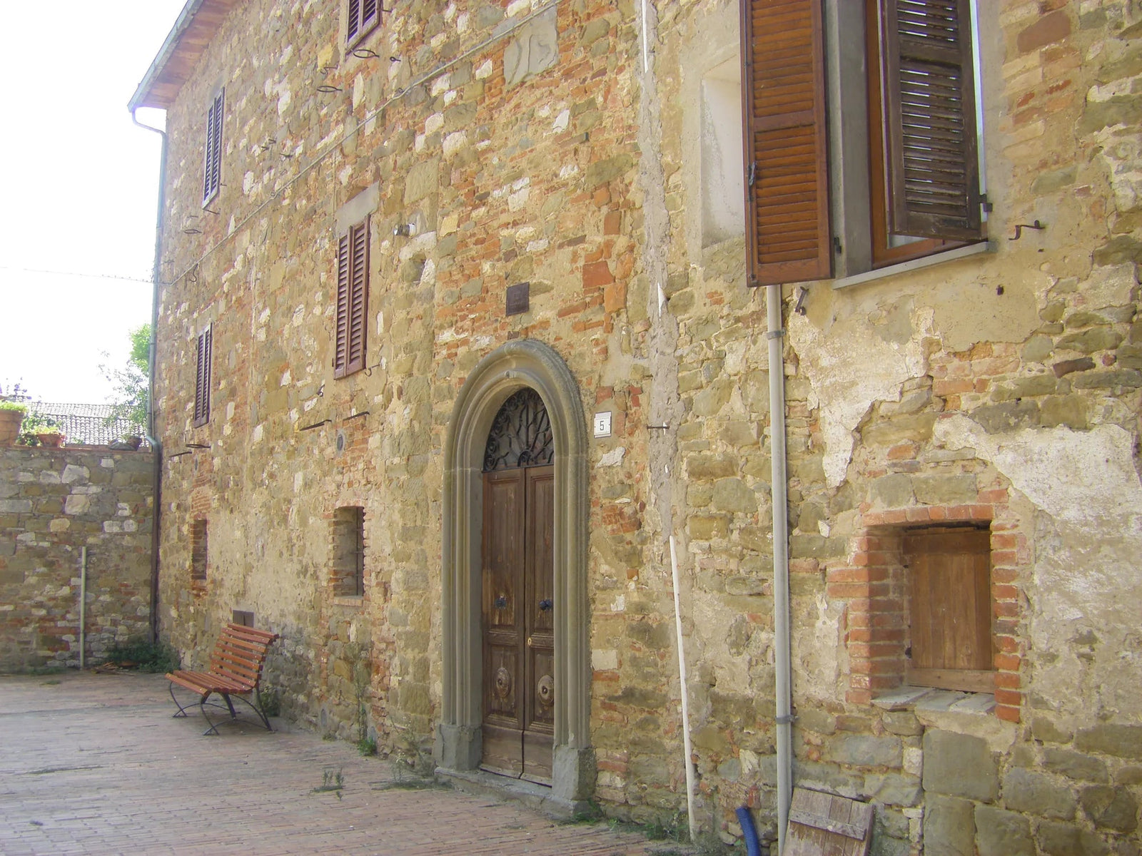 Weathered Italian stone villa, inspiration for the JD label