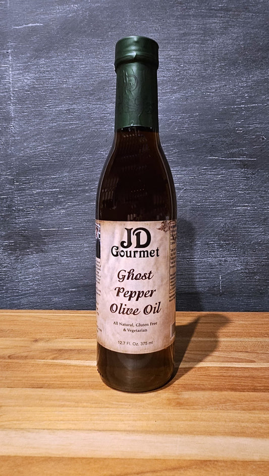 Bottle of JD Gourmet Ghost Pepper Olive Oil, a chili-infused olive oil