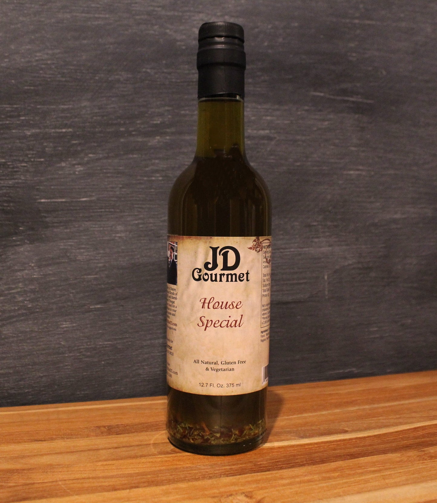 Bottle of JD Gourmet Jeff's Special Blend, Italian extra virgin olive oil with garlic and Parmesan