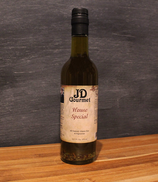 Bottle of JD Gourmet Jeff's Special Blend, Italian extra virgin olive oil with garlic and Parmesan
