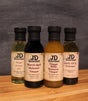 JD Gourmet Four Pack Sampler — four 6oz bottles of balsamic vinegar and infused olive oil in a gift set