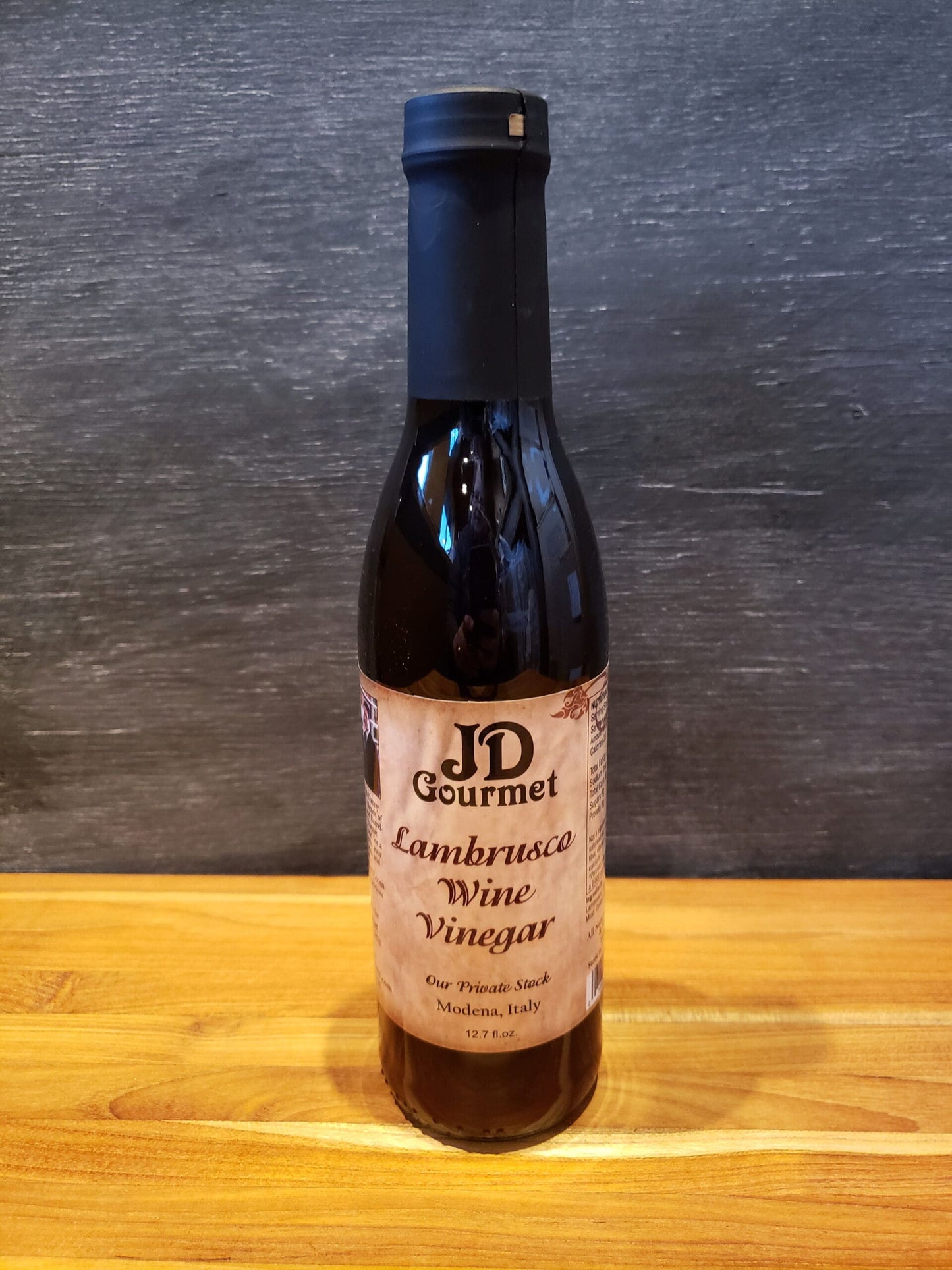 Bottle of JD Gourmet Lambrusco Wine Vinegar, a wine vinegar for salads
