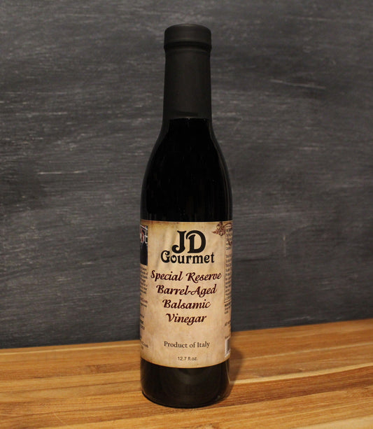 Bottle of JD Gourmet Special Reserve aged Italian balsamic vinegar, dark and thick