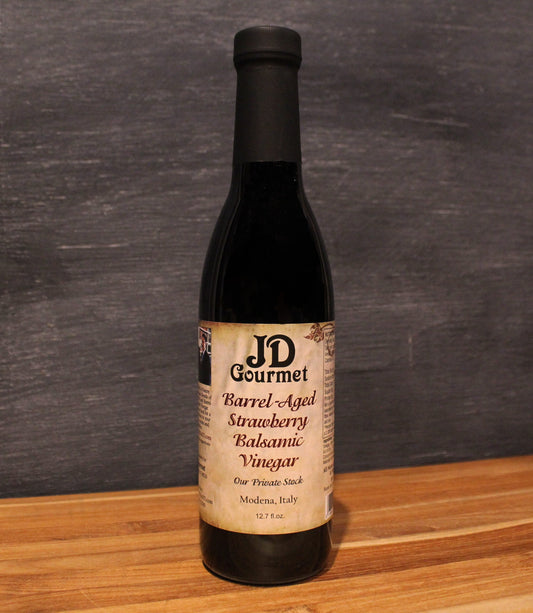 Bottle of JD Gourmet Strawberry Balsamic Vinegar, dark barrel-aged Modena balsamic with real strawberry