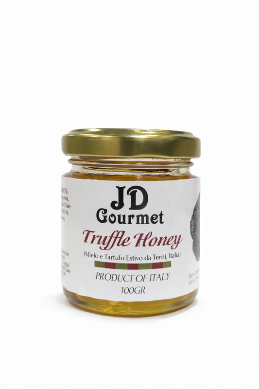 Jar of JD Gourmet Truffle Honey, golden Italian acacia honey infused with black summer truffle