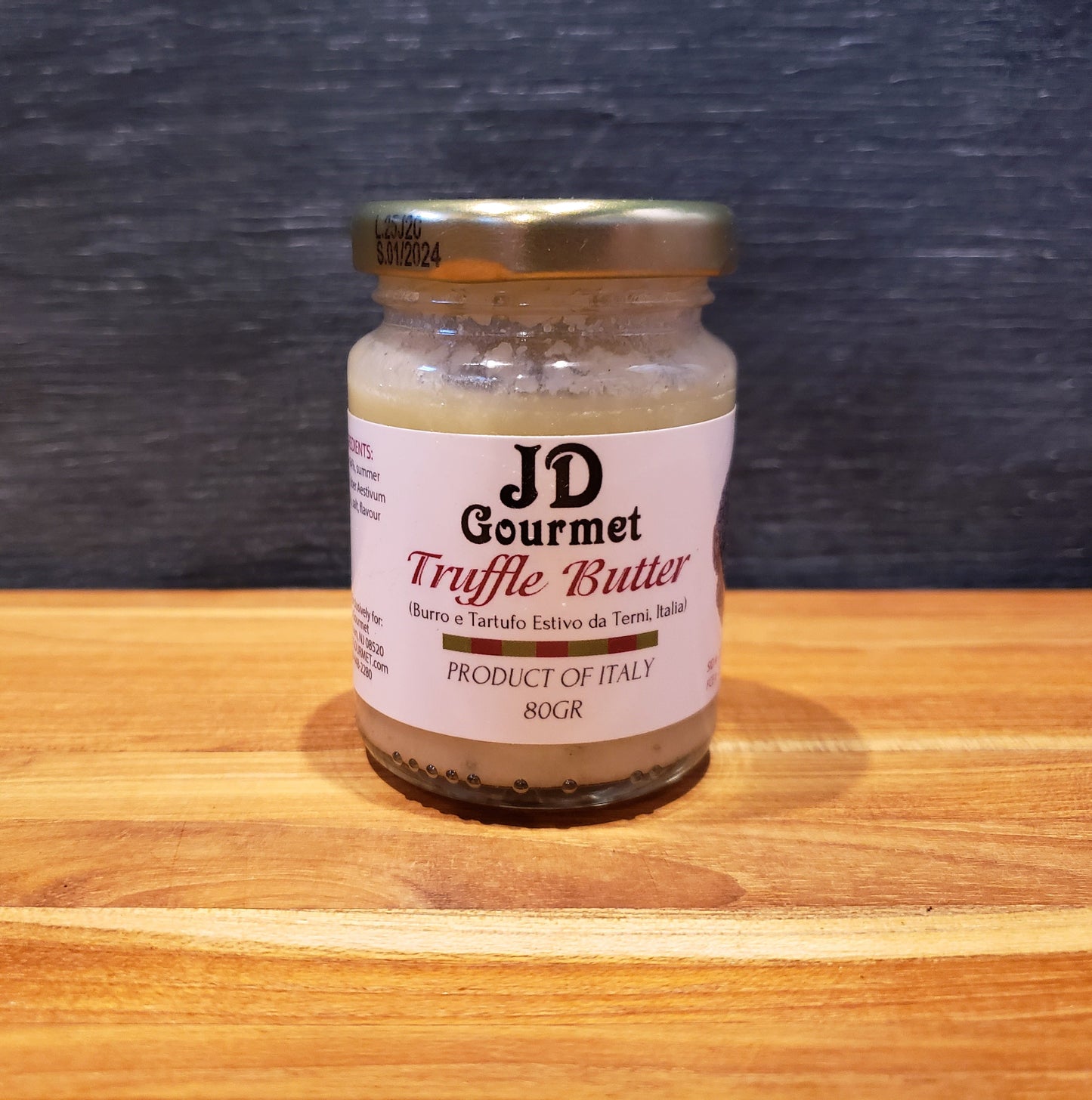 Container of JD Gourmet Truffle Butter, a rich savory finishing butter with earthy truffle aroma