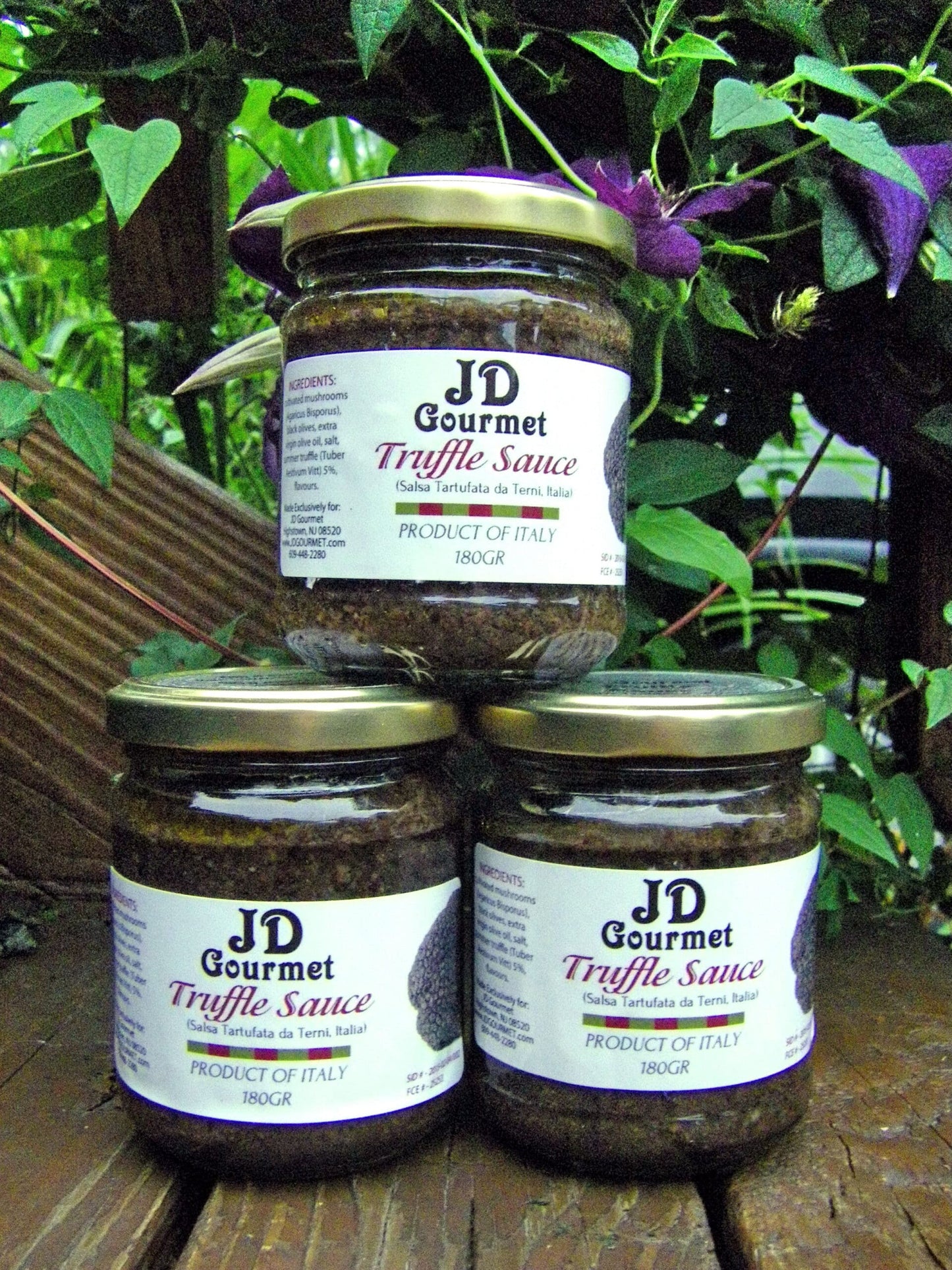 JD Gourmet Truffle Sauce jar made with Black Summer Truffles and black olives, earthy savory spread