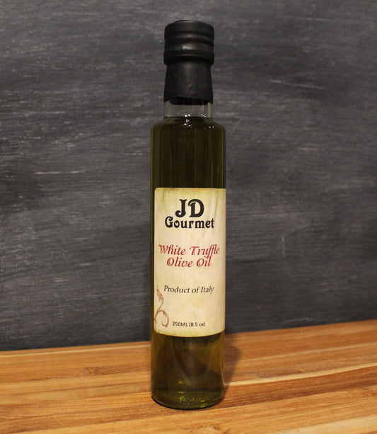 JD Gourmet White Truffle Oil bottle, clear golden extra virgin olive oil infused with white truffles