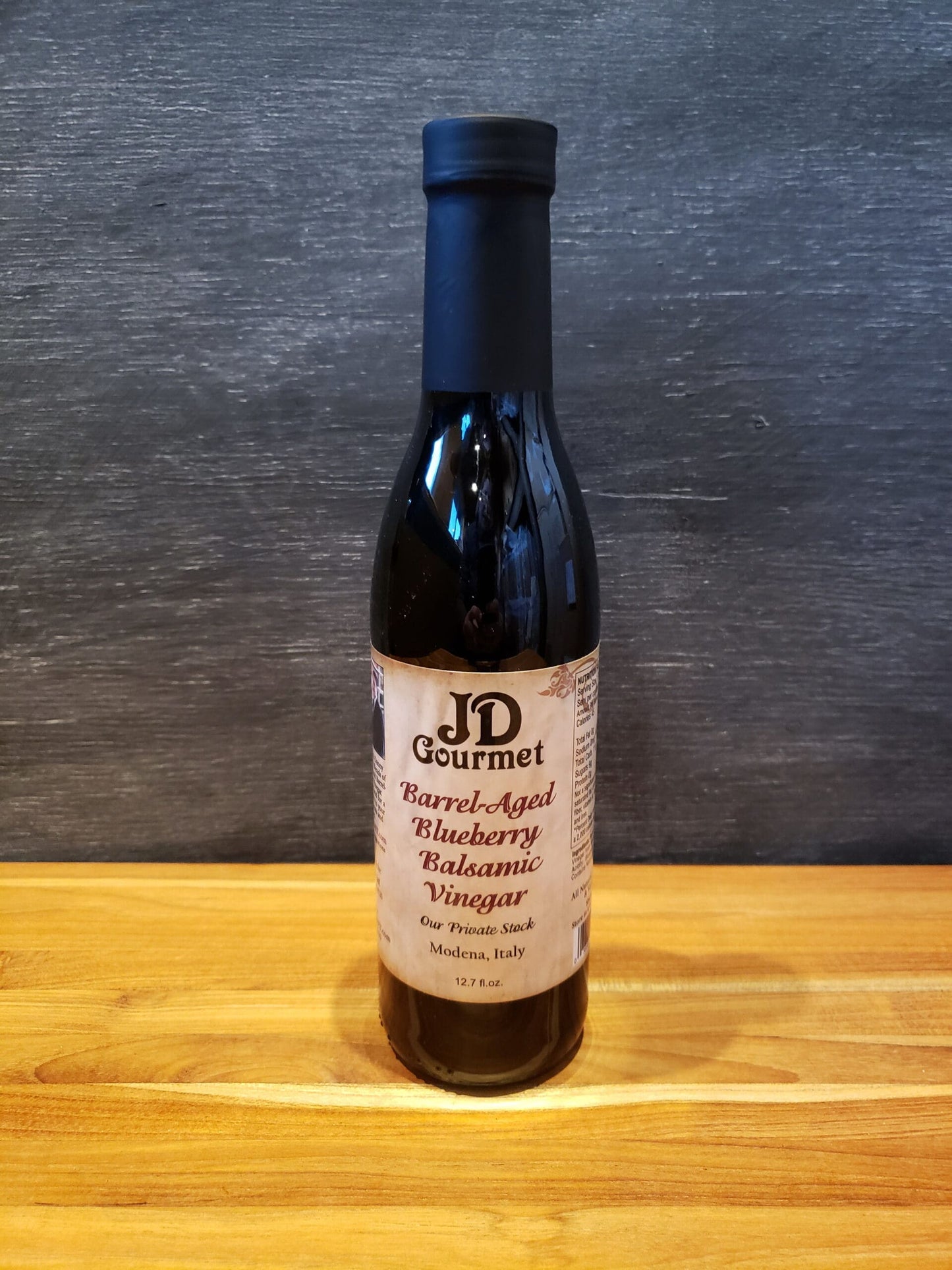 JD Gourmet Blueberry Balsamic Vinegar bottle, balsamic vinegar blended with real blueberry puree